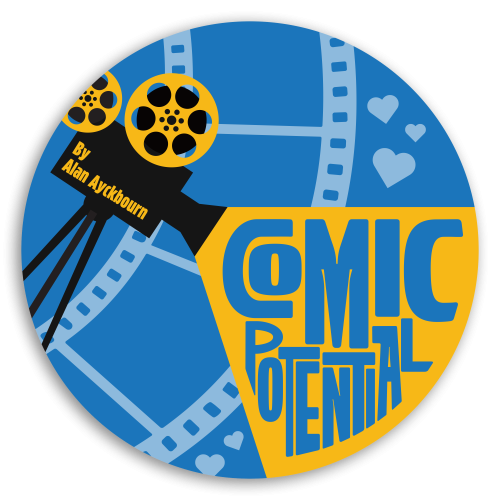 A reel to reel video camera with film and hearts in the background
