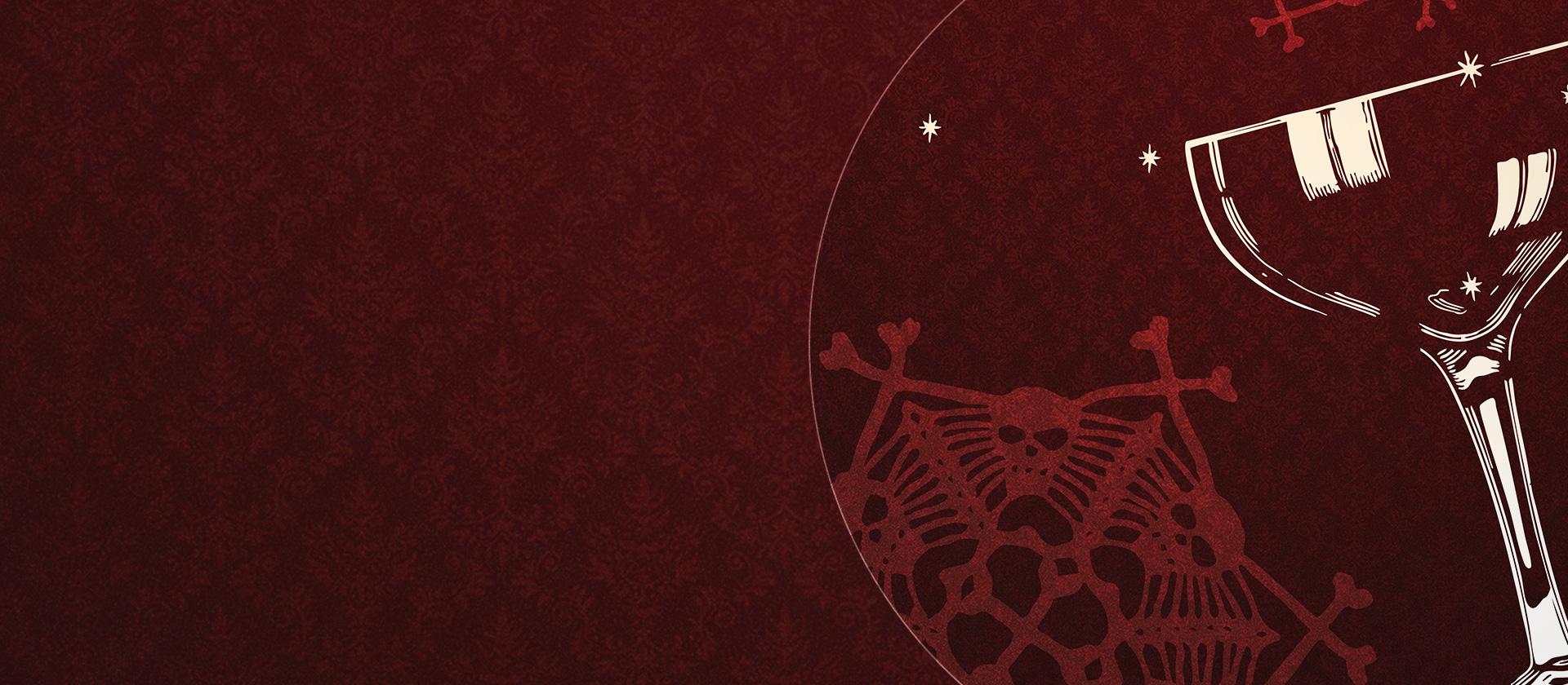 A cocktail glass atop a background full of lace with a skull and bones pattern
